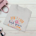 Inspirational Unisex Softstyle T-Shirt - 'Don't Look Back You're Not Going That Way' - Motivational Apparel for Everyday Wear - GULLYDESIGN