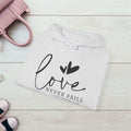 Inspirational Love Sweatshirt - Unisex Heavy Blend™ Hoodie with 1 Corinthians 13:8 - GULLYDESIGN